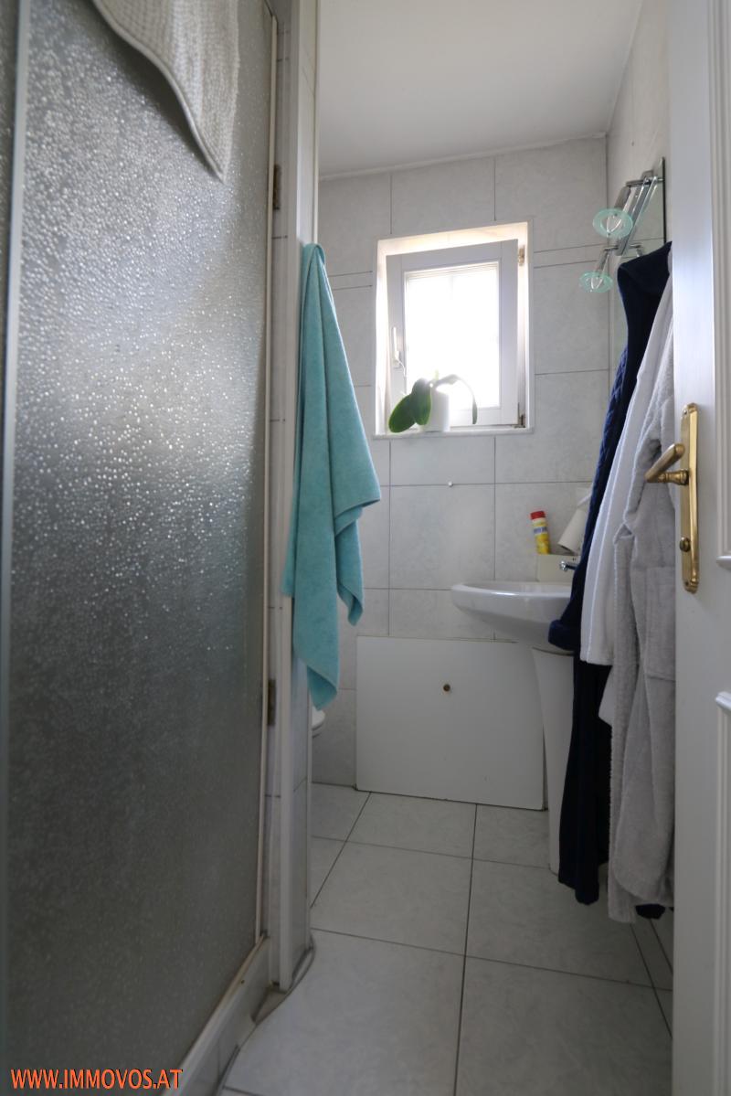small bathroom with shower/toilet