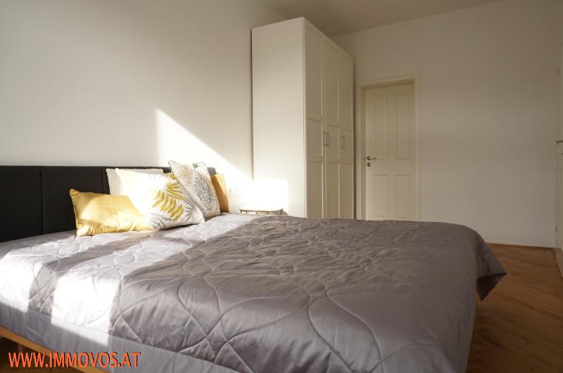 bedroom with double bed + cabinet